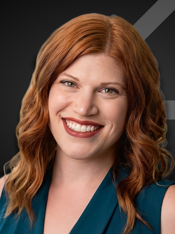Serena Timko, Loan Officer at Kash Mortgage Group, smiling portrait with a dark background.